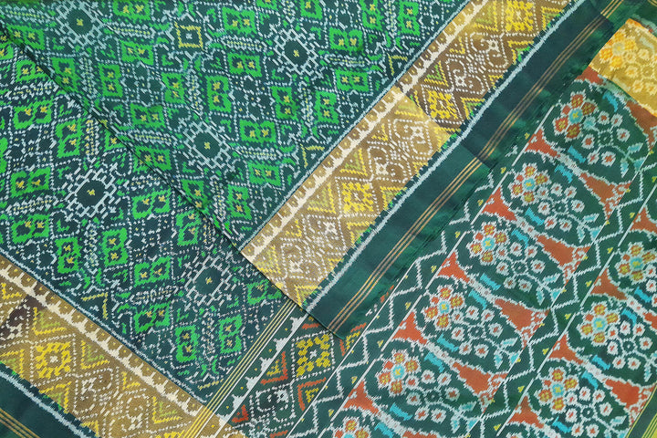 Handwoven Patola pure silk saree in  green in pan bhat  pattern