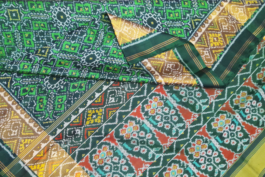 Handwoven Patola pure silk saree in  green in pan bhat  pattern