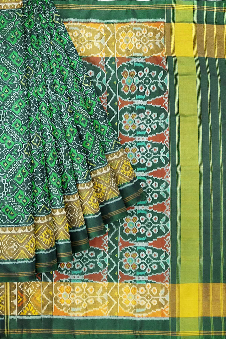 Handwoven Patola pure silk saree in  green in pan bhat  pattern