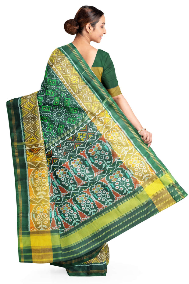 Handwoven Patola pure silk saree in  green in pan bhat  pattern