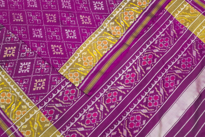 Handwoven Patola pure silk saree in purple  in diamond  pattern