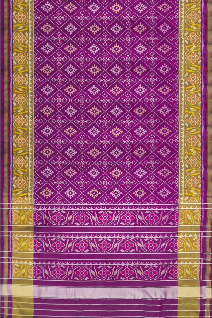 Handwoven Patola pure silk saree in purple  in diamond  pattern