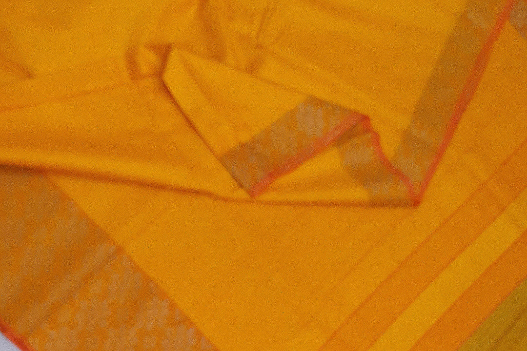 Handloom desi tussar pure silk saree in yellow with floral pattern in border