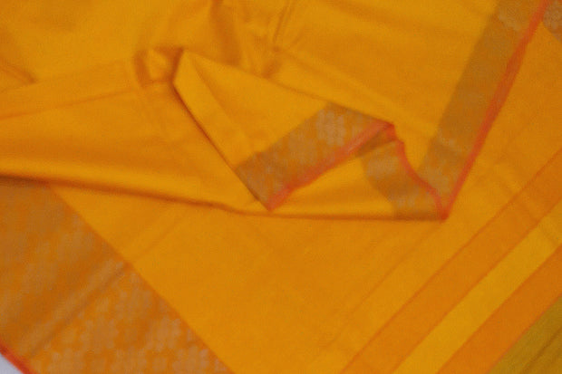 Handloom desi tussar pure silk saree in yellow with floral pattern in border