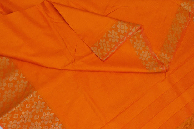 Handloom desi tussar pure silk saree in orange with floral pattern in border