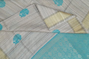 Desi tussar pure silk saree in teal blue  colour floral motifs on the body and a zari pallu in floral pattern
