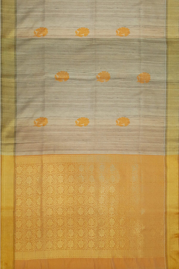 Desi tussar pure silk saree in orange  colour floral motifs on the body and a zari pallu in floral pattern