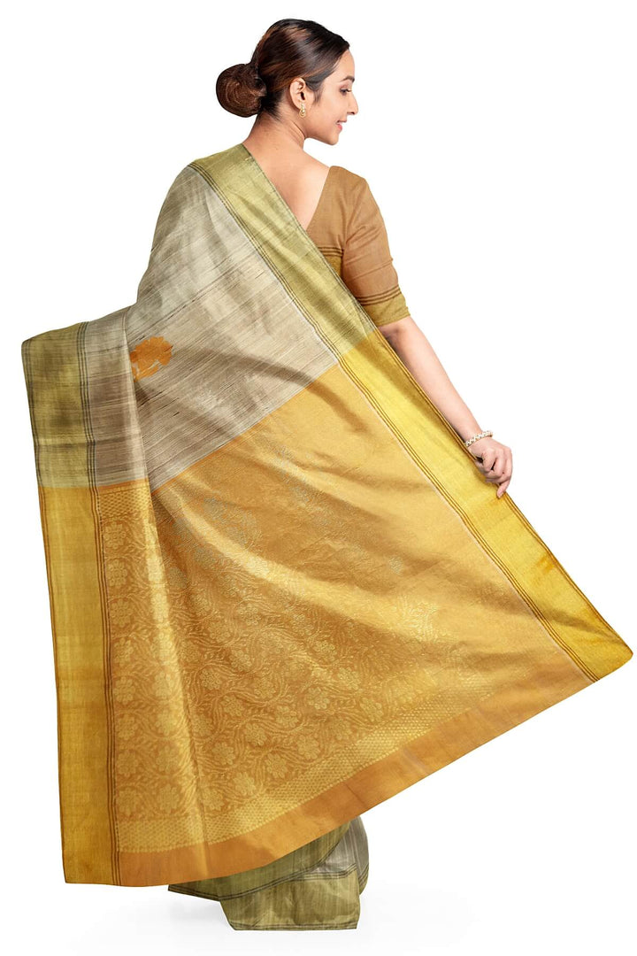 Desi tussar pure silk saree in orange  colour floral motifs on the body and a zari pallu in floral pattern
