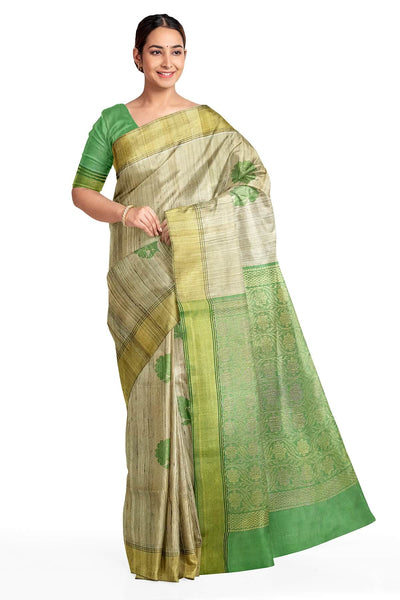 Desi tussar pure silk saree in green  colour floral motifs on the body