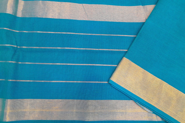 Handloom Uppada pure cotton saree in copper sulphate blue with ikat patterned border